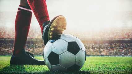 Custom blinds with your photo feet of soccer player tread on soccer ball for kick-off in the stadium